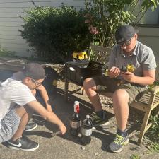 Two male Abbotsford middle school students working outside on a summer school project.